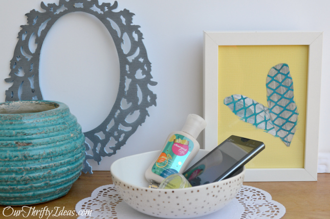 Framed Feather Decor from OurThriftyIdeas.com